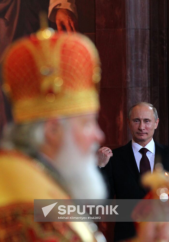 Vladimir Putin and Dmitry Medvedev attend Easter service