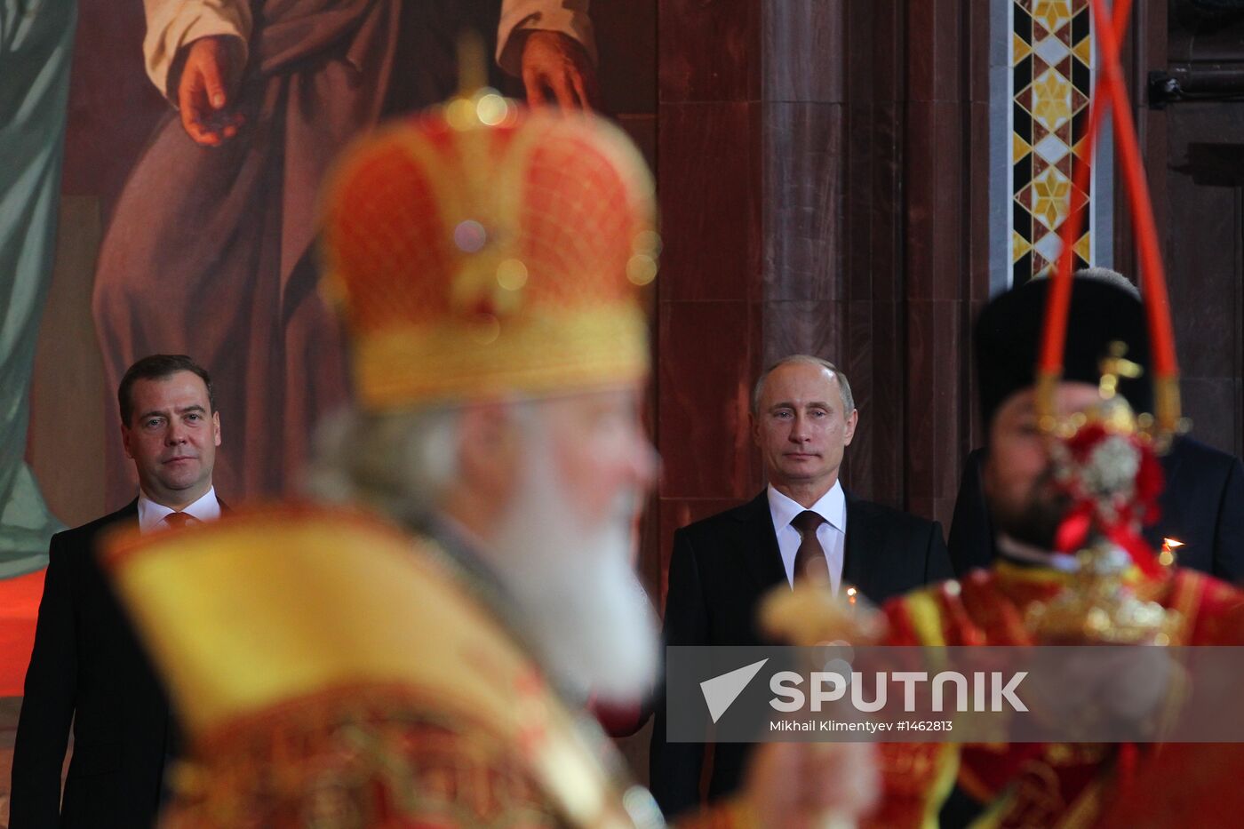 Vladimir Putin and Dmitry Medvedev attend Easter service
