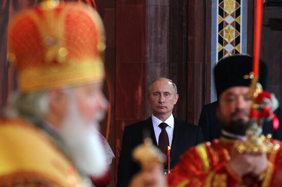 Vladimir Putin and Dmitry Medvedev attend Easter service