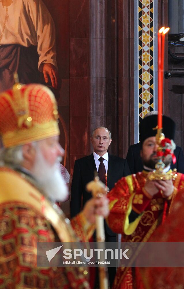 Vladimir Putin and Dmitry Medvedev attend Easter service