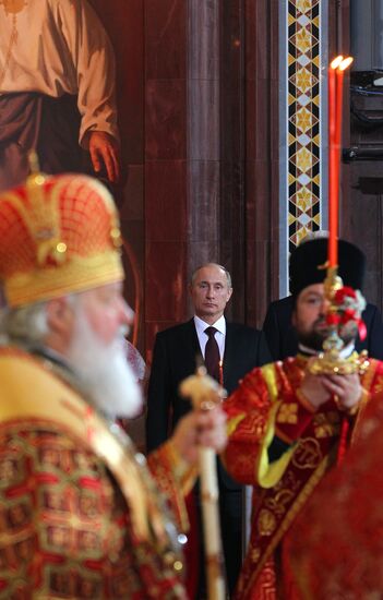 Vladimir Putin and Dmitry Medvedev attend Easter service
