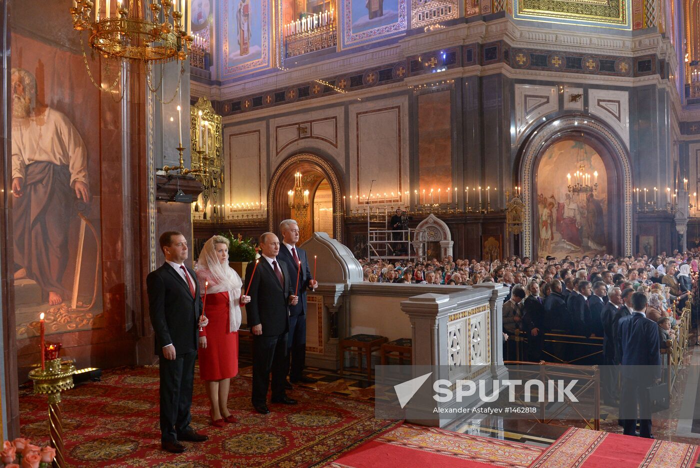 Vladimir Putin and Dmitry Medvedev attend Easter service