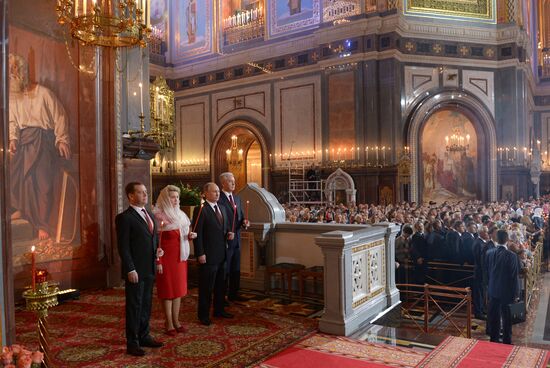 Vladimir Putin and Dmitry Medvedev attend Easter service
