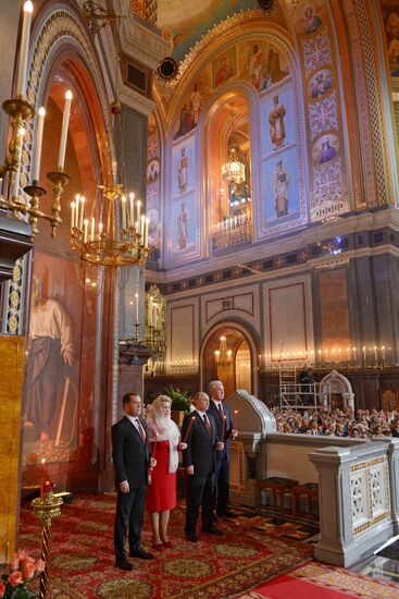 Vladimir Putin and Dmitry Medvedev attend Easter service