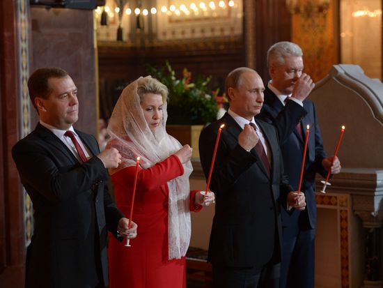 Vladimir Putin and Dmitry Medvedev attend Easter service