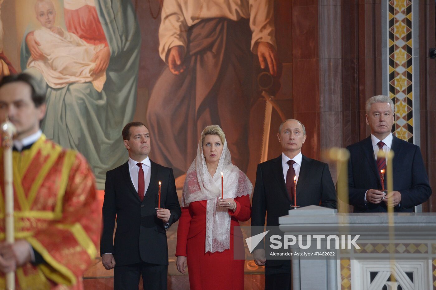 Vladimir Putin and Dmitry Medvedev attend Easter service