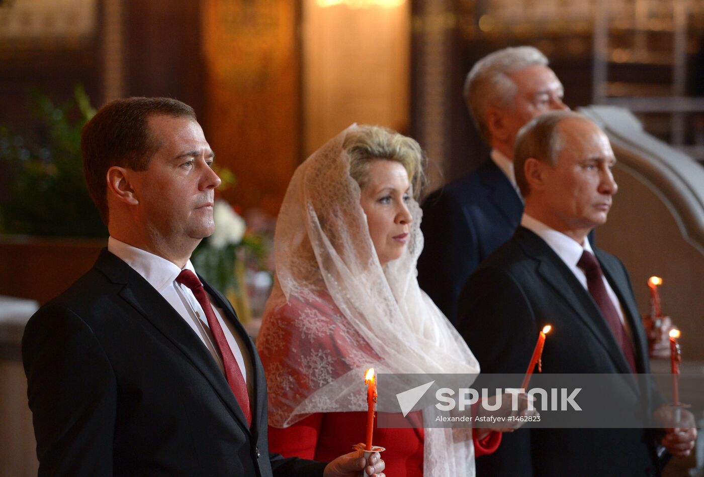 Vladimir Putin and Dmitry Medvedev attend Easter service