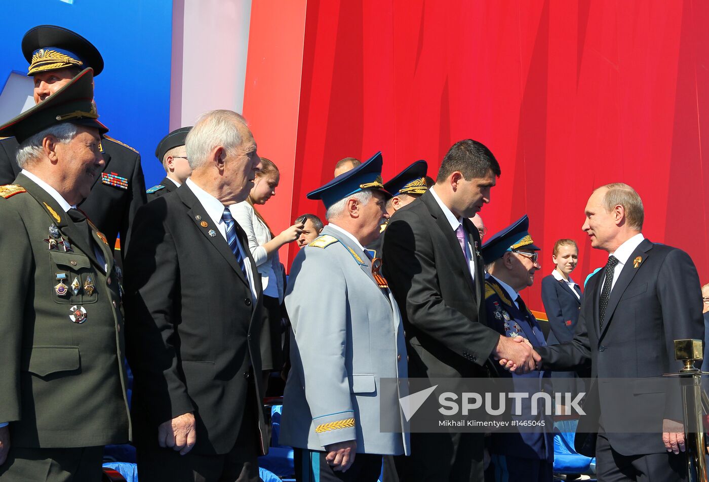 Vladimir Putin attends parade on Red Square