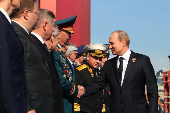 Vladimir Putin attends parade on Red Square