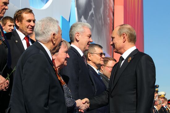 Vladimir Putin attends parade on Red Square
