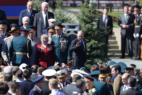 Vladimir Putin attends parade on Red Square