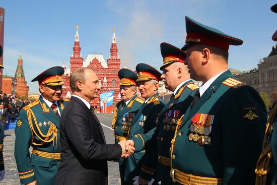 Vladimir Putin attends parade on Red Square