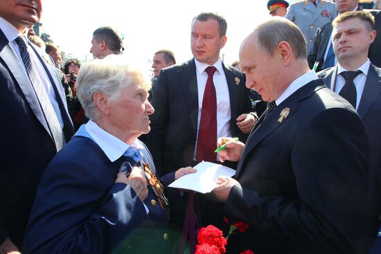 Vladimir Putin attends parade on Red Square
