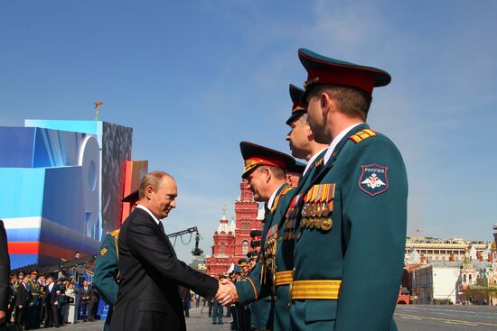 Vladimir Putin attends parade on Red Square