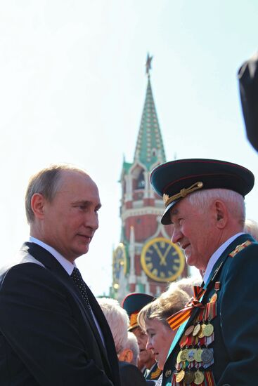 Vladimir Putin attends parade on Red Square