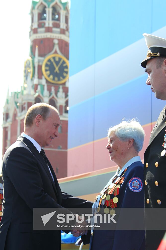 Vladimir Putin attends parade on Red Square