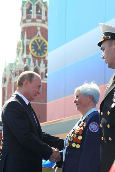 Vladimir Putin attends parade on Red Square