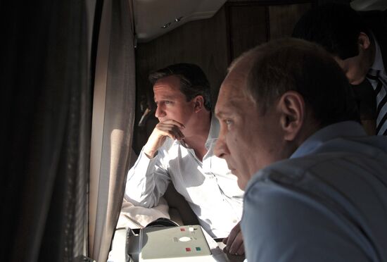 David Cameron and Vladimir Putin view Olympic venues