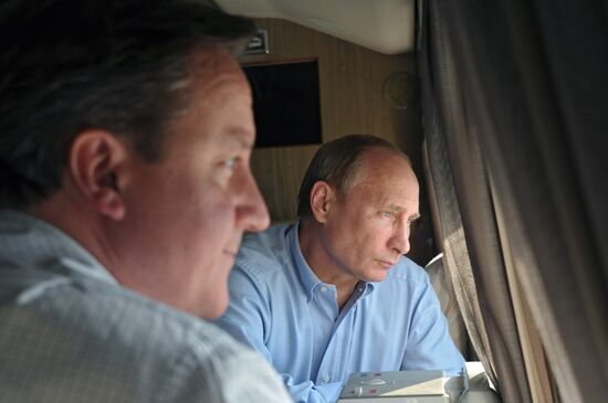 David Cameron and Vladimir Putin view Olympic venues