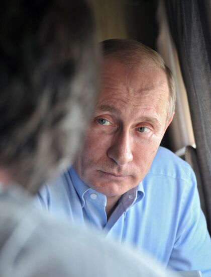 David Cameron and Vladimir Putin view Olympic venues