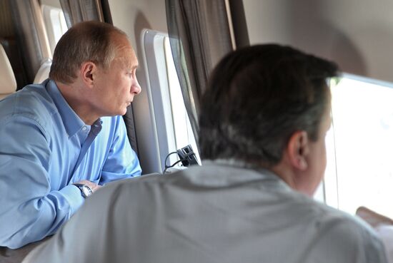 David Cameron and Vladimir Putin view Olympic venues