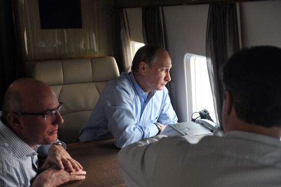 David Cameron and Vladimir Putin view Olympic venues