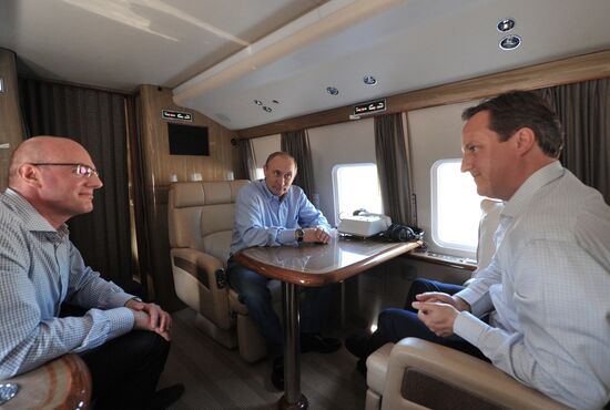 David Cameron and Vladimir Putin view Olympic venues