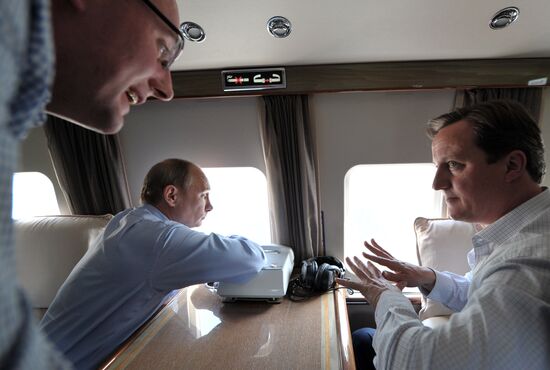 David Cameron and Vladimir Putin view Olympic venues
