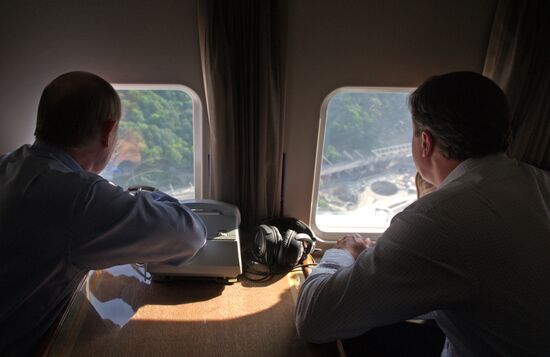 David Cameron and Vladimir Putin view Olympic venues