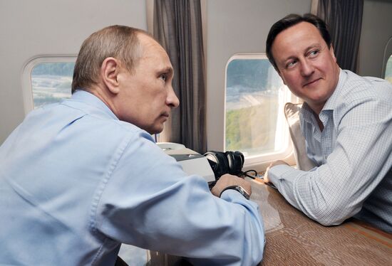 David Cameron and Vladimir Putin view Olympic venues