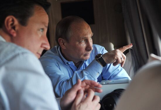 David Cameron and Vladimir Putin view Olympic venues