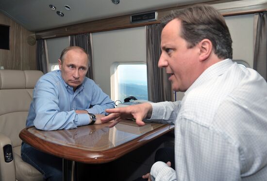 David Cameron and Vladimir Putin view Olympic venues