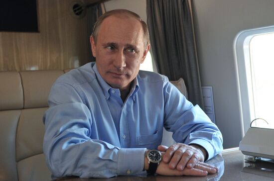 David Cameron and Vladimir Putin view Olympic venues