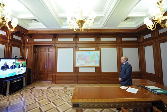 Vladimir Putin holds video conference with OECD Forum