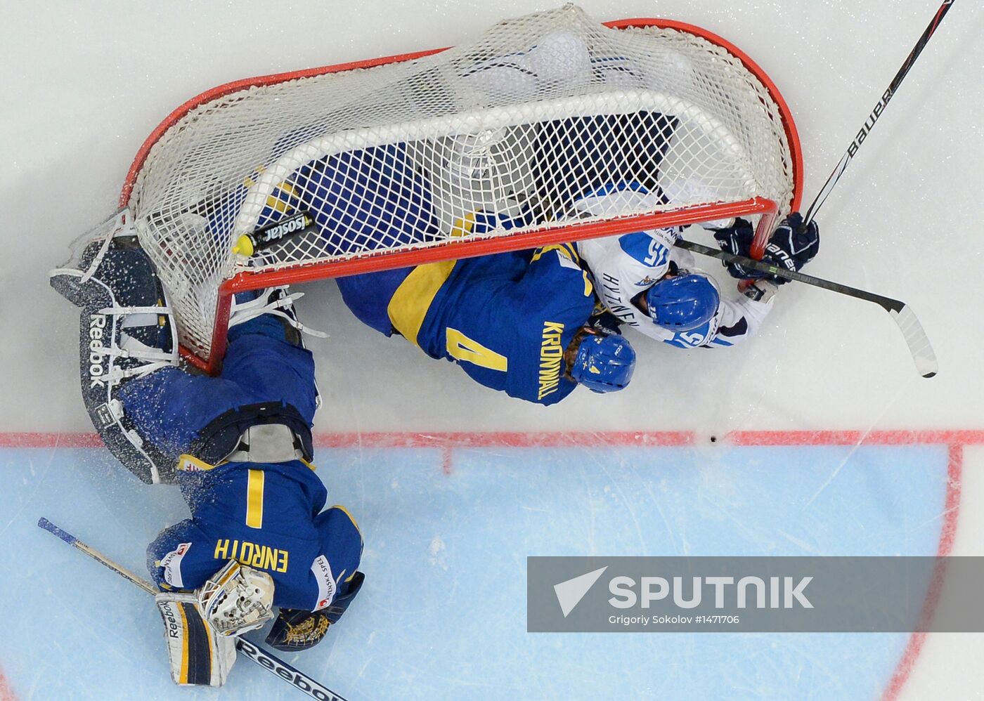 From left: Sweden's goaltender Jhonas Enroth, Sweden's Staffan Kronwall and Finland's Juha-Pekka Hytonen in the Ice Hockey World Championship semifinal match between the national teams of Finland and Sweden. Location: Sweden, Stockholm. Author: Grigoriy Sokolov/Sputnik. Hockey World Championship. Finland vs. Sweden