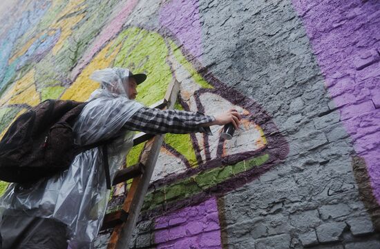 Graffiti painting during Best City in the World Festival