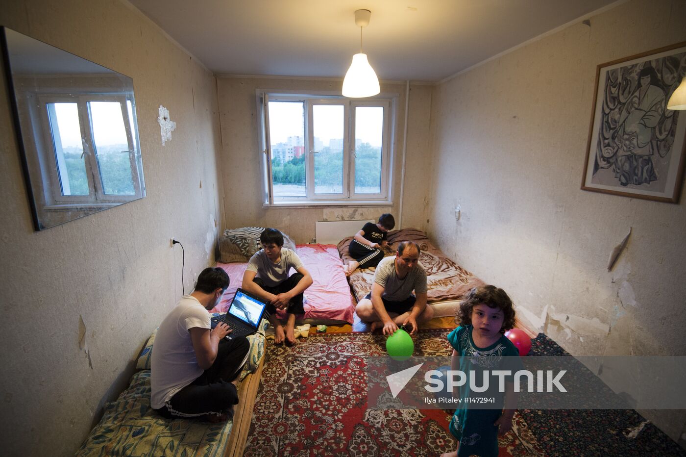 Migrant family from Tajikistan