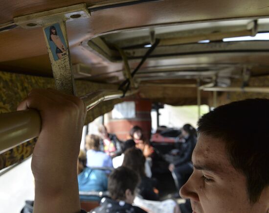 Riding commuter bus in Omsk Region