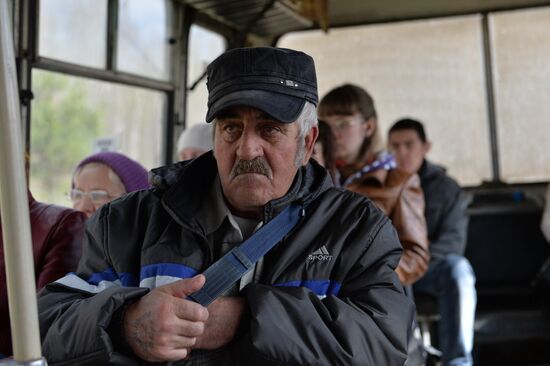 Riding commuter bus in Omsk Region