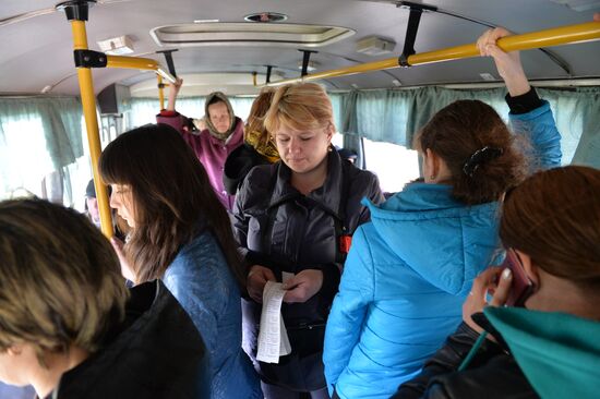 Riding commuter bus in Omsk Region