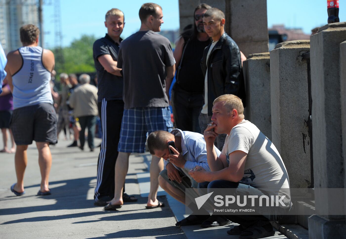 Smokers on a street in Yekaterinburg. Location: Russia, Yekaterinburg. Author: Pavel Lisitsyn/Sputnik. Smoking ban enacted on June 1