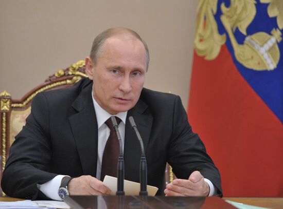 Vladimir Putin chairs meeting in the Kremlin