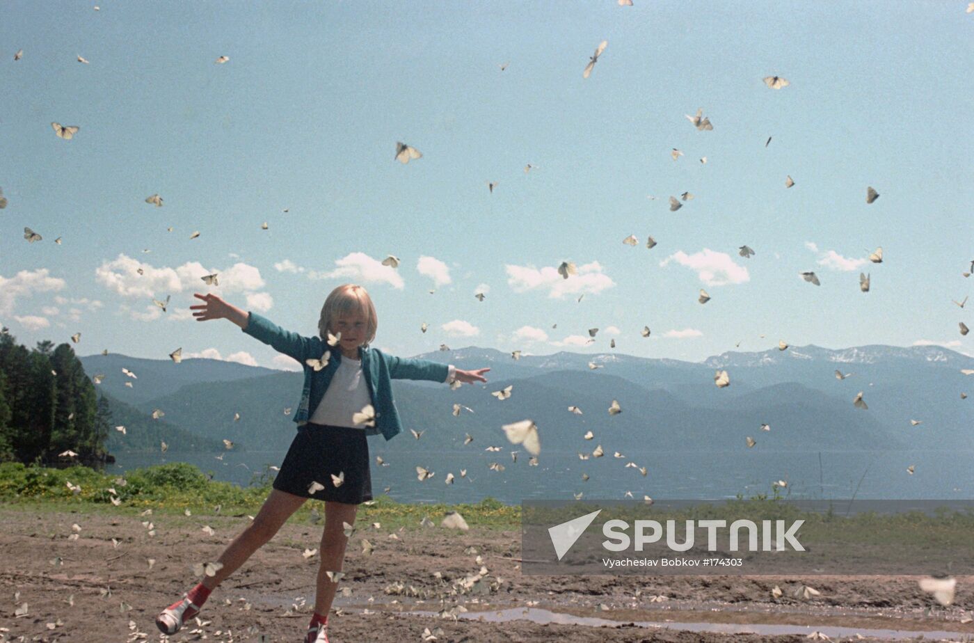 Altai region nature reserve girl butterflies