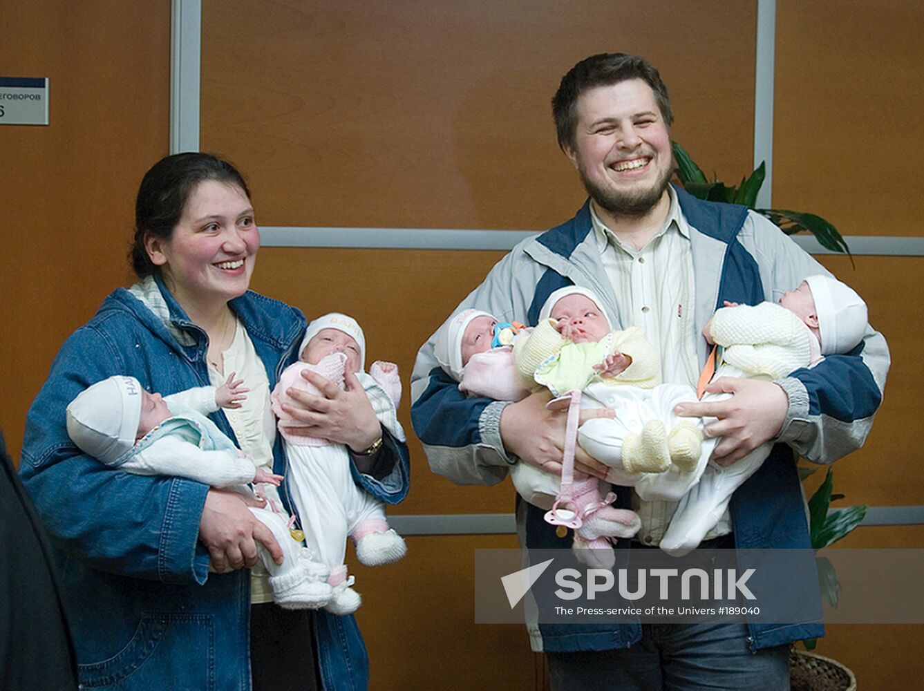 Dmitry and Varvara Artamkin with their daughters