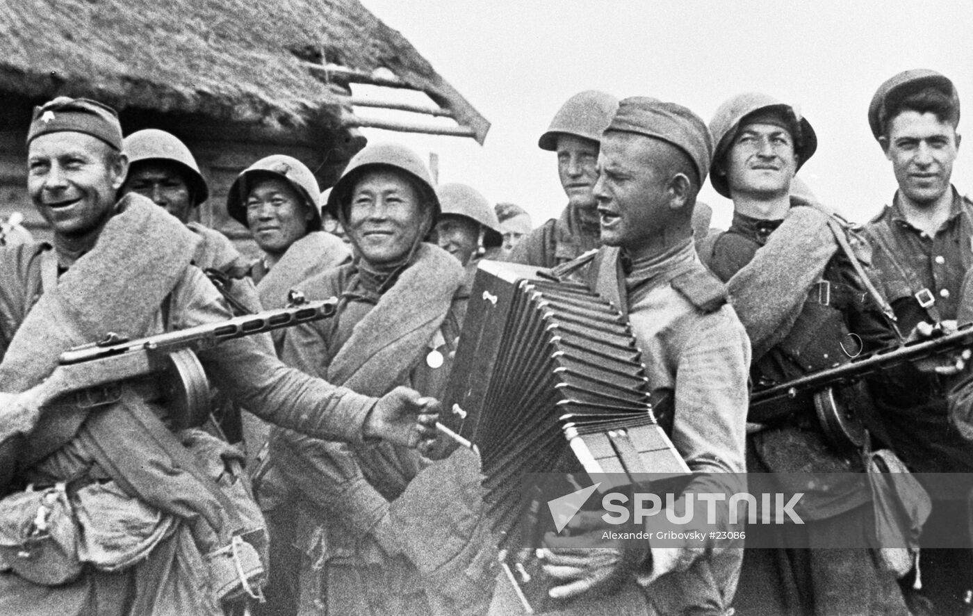 WWII SOLDIER ACCORDION PLAYING 