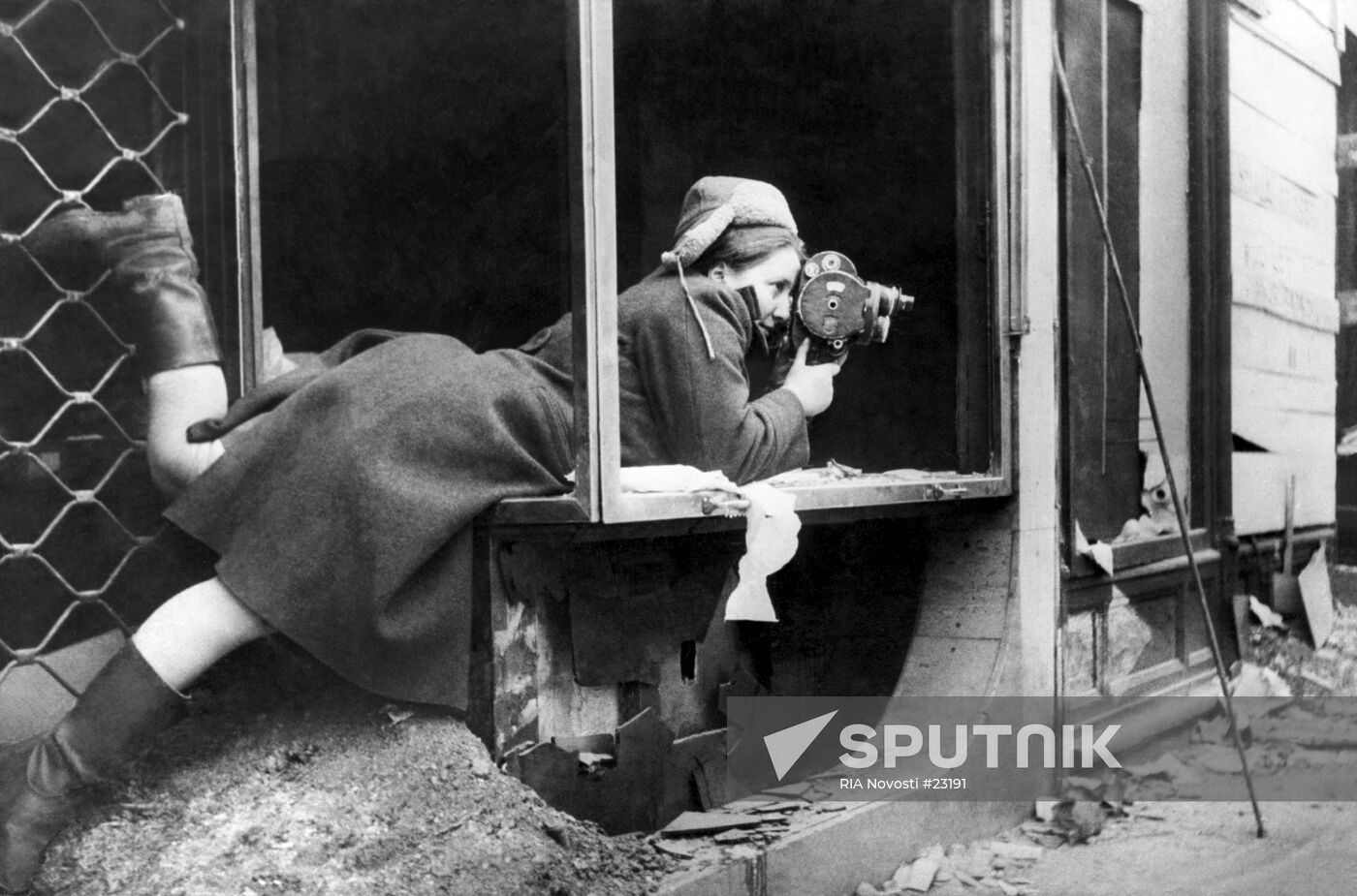 WWII CAMERA OPERATOR REIZMAN SHOOTING 