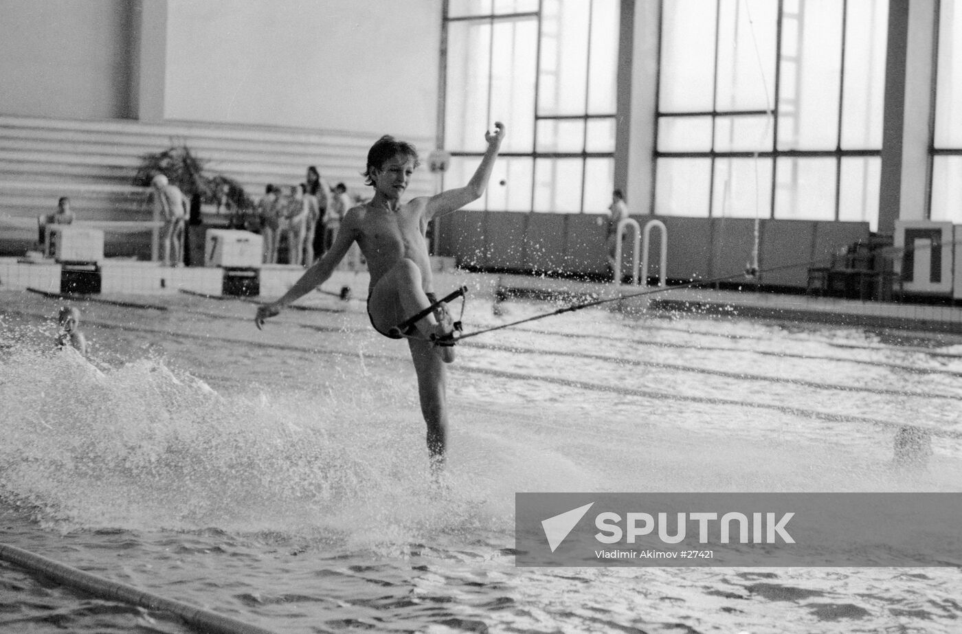 BOY WATER SKIING