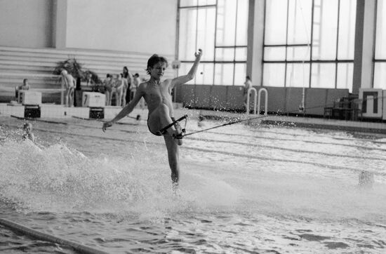BOY WATER SKIING
