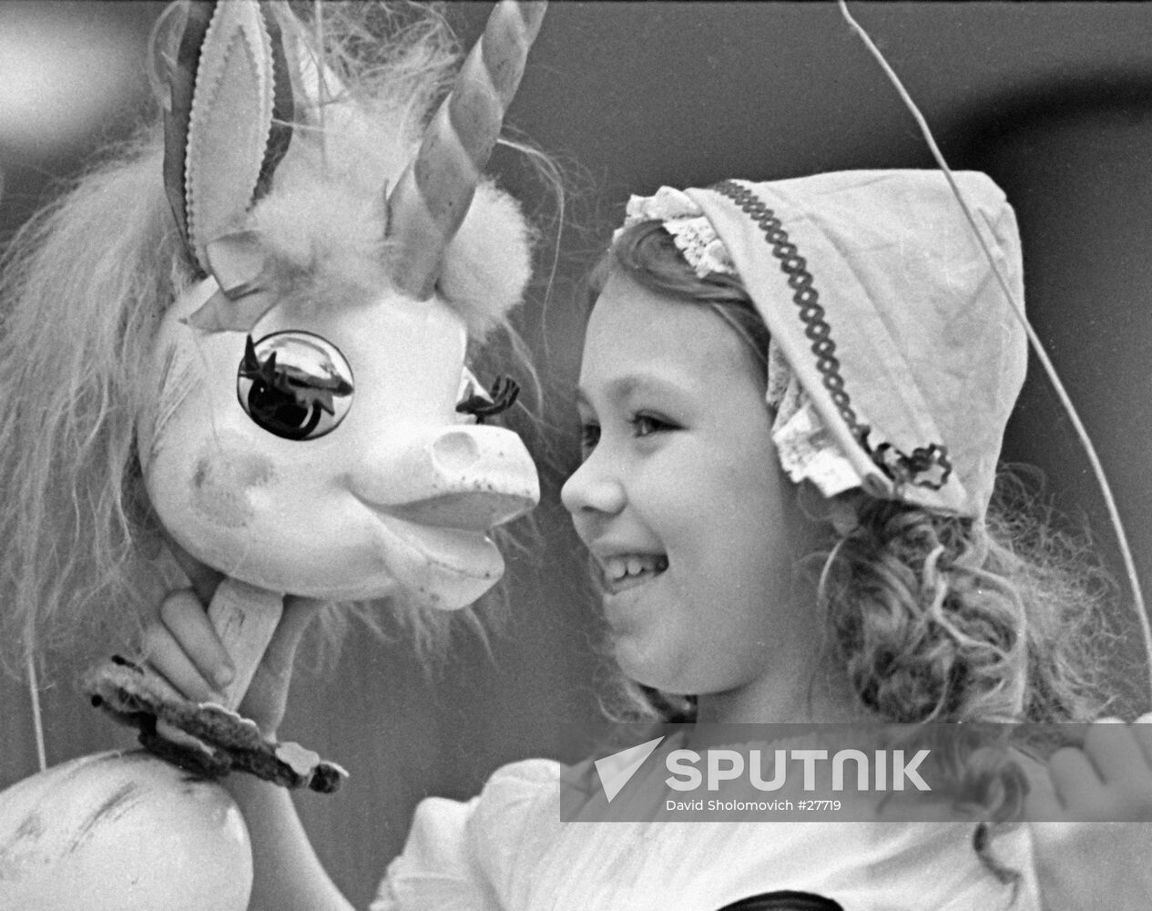 A Moscow schoolgirl with a puppet 