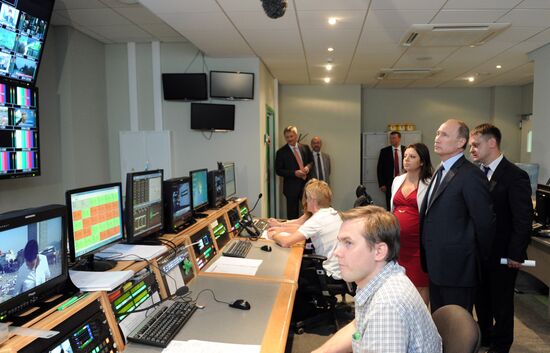 Vladimir Putin visits Russia Today television channel